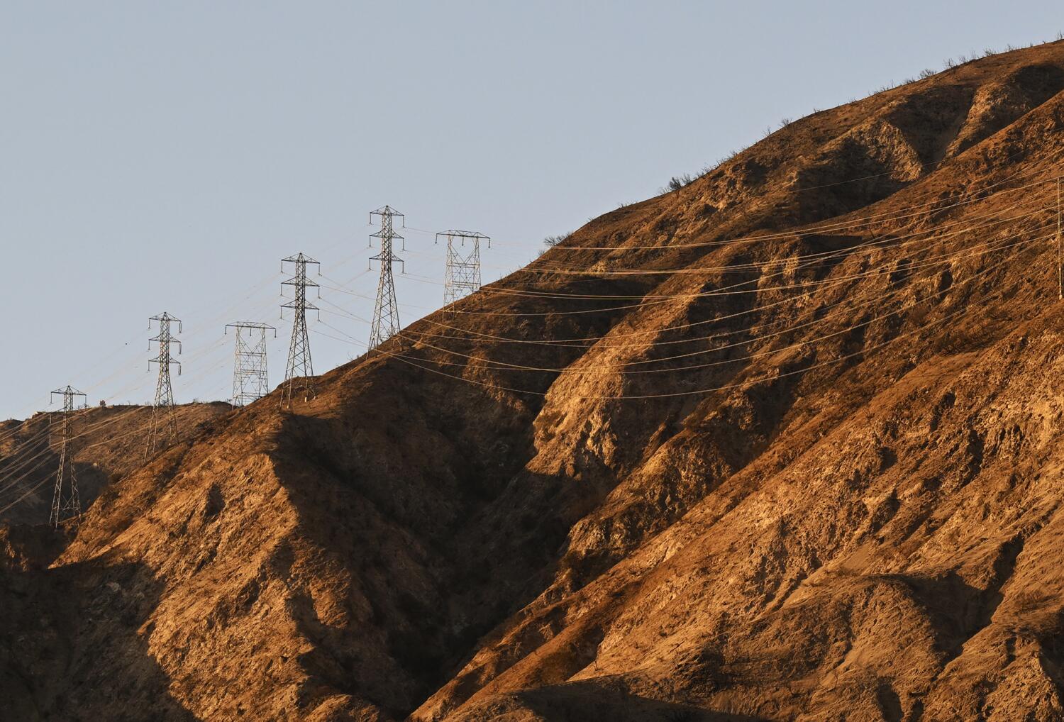 Wildfire victims decry state law protecting utilities from cost of disasters they cause